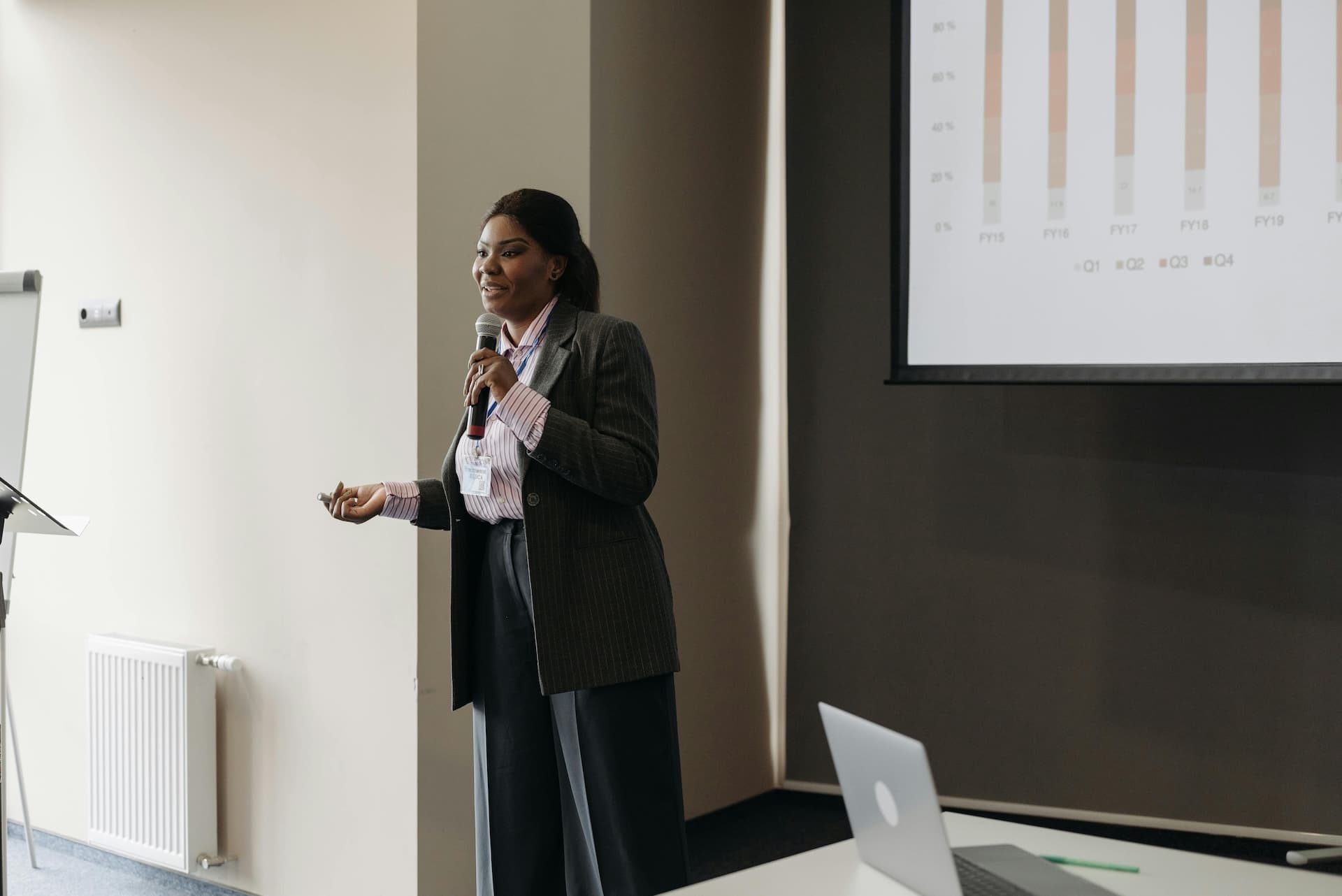 An instructor presenting to a professional audience